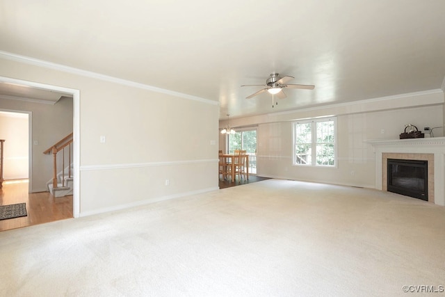5636 Charter Oak Dr, Chesterfield, VA 23832 - unfurnished living room with a ceiling fan, crown molding, carpet floors, a fireplace, and stairs