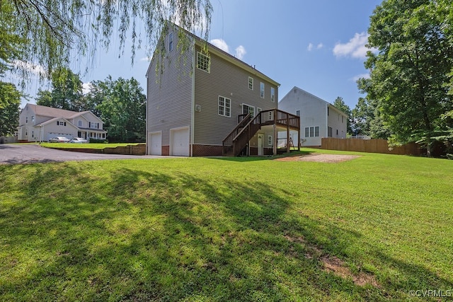 5636 Charter Oak Dr, Chesterfield, VA 23832 - back of house featuring stairs, a garage, driveway, and a wooden deck