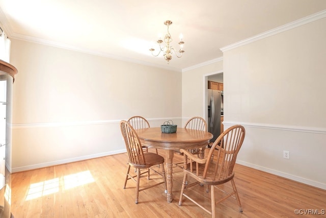 5636 Charter Oak Dr, Chesterfield, VA 23832 - dining room featuring a chandelier, light wood-style flooring, and ornamental molding