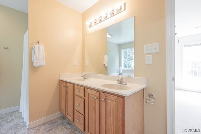 5636 Charter Oak Dr, Chesterfield, VA 23832 - full bathroom featuring double vanity and stone finish floors