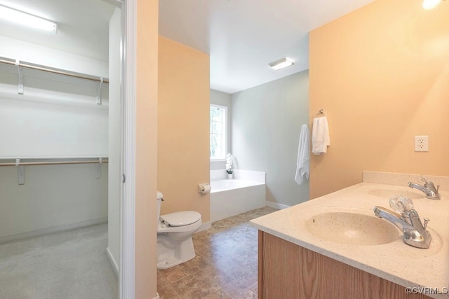 5636 Charter Oak Dr, Chesterfield, VA 23832 - bathroom with a bath, double vanity, and a spacious closet