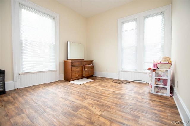 410 E 2nd St, Farmville, VA 23901 - bedroom featuring wood finished floors and multiple windows
