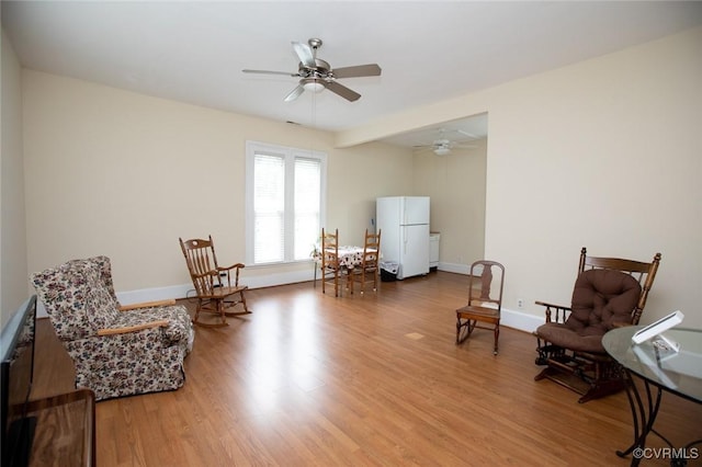 410 E 2nd St, Farmville, VA 23901 - living area featuring wood finished floors and ceiling fan