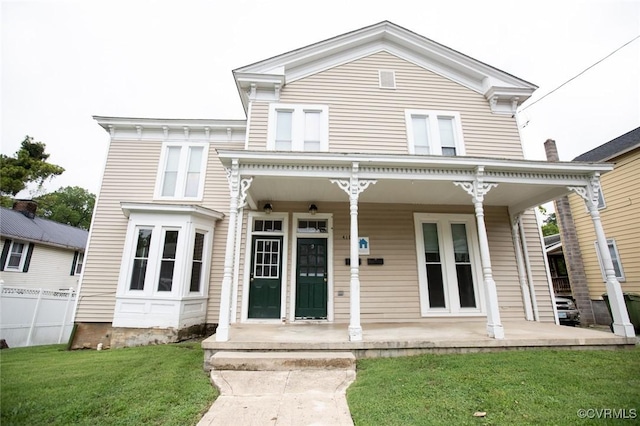 410 E 2nd St, Farmville, VA 23901 - view of front of house featuring a porch and a front yard