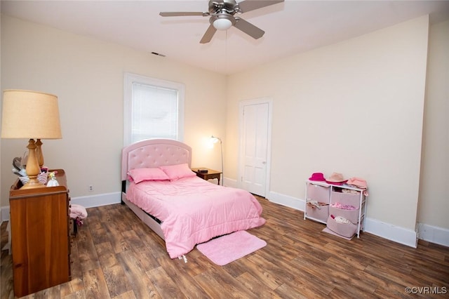 410 E 2nd St, Farmville, VA 23901 - bedroom with wood finished floors and a ceiling fan
