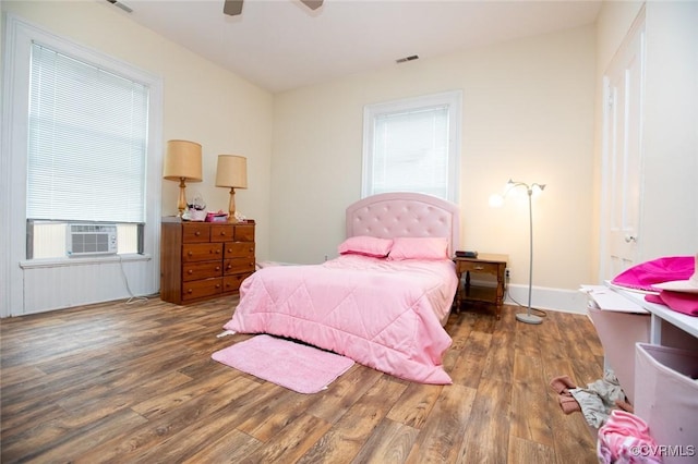 410 E 2nd St, Farmville, VA 23901 - bedroom with cooling unit, wood finished floors, and a ceiling fan