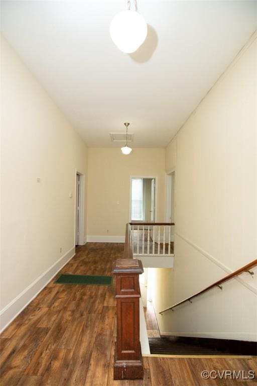 410 E 2nd St, Farmville, VA 23901 - staircase featuring wood finished floors and baseboards