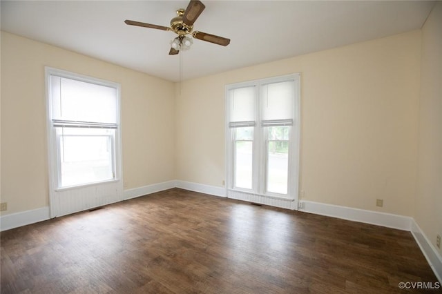 410 E 2nd St, Farmville, VA 23901 - empty room with wood finished floors and a ceiling fan