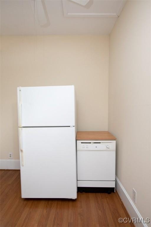 410 E 2nd St, Farmville, VA 23901 - kitchen with white appliances and wood finished floors