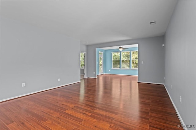 8334 E Lord Botetourt Loop, New Kent, VA 23124 - unfurnished room with a ceiling fan and wood finished floors