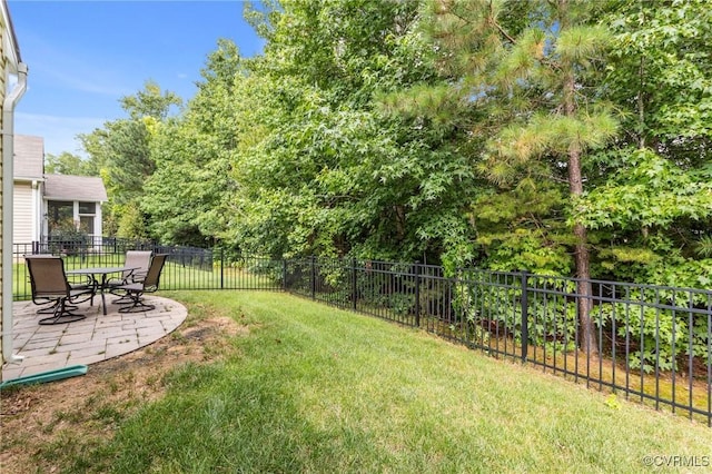 8334 E Lord Botetourt Loop, New Kent, VA 23124 - fenced backyard with a patio