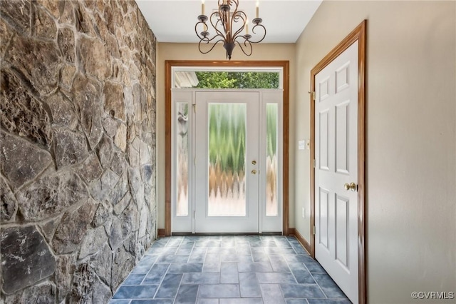6002 Prospectors Bluff Ln, Mechanicsville, VA 23116 - entryway with stone finish flooring and a chandelier