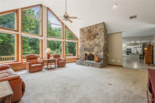 6002 Prospectors Bluff Ln, Mechanicsville, VA 23116 - carpeted living area featuring high vaulted ceiling, healthy amount of natural light, ceiling fan, and a fireplace