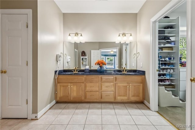 6002 Prospectors Bluff Ln, Mechanicsville, VA 23116 - bathroom with double vanity, tile patterned flooring, and a closet
