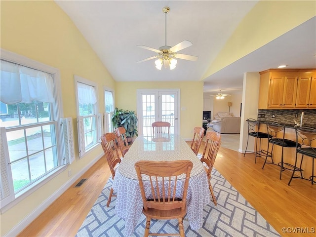 231 White Sand Ct, Colonial Heights, VA 23834 - dining room featuring ceiling fan, light wood-style flooring, and high vaulted ceiling