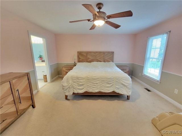 231 White Sand Ct, Colonial Heights, VA 23834 - bedroom with light carpet, ceiling fan, and connected bathroom