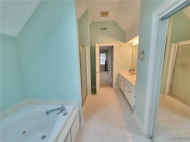 231 White Sand Ct, Colonial Heights, VA 23834 - bathroom featuring a stall shower, a tub with jets, vanity, lofted ceiling, and tile patterned floors