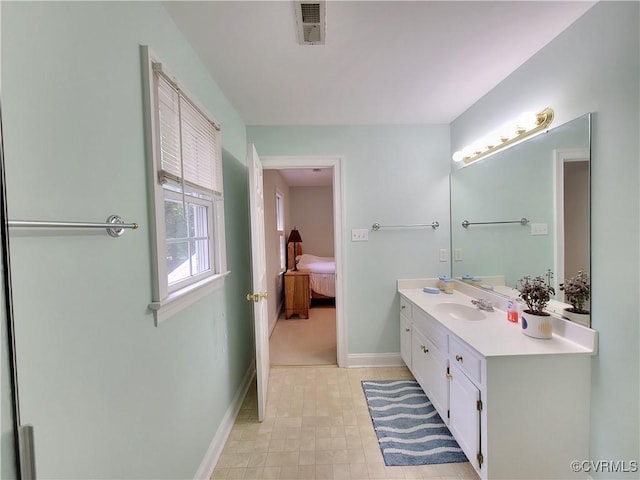 231 White Sand Ct, Colonial Heights, VA 23834 - ensuite bathroom featuring vanity and baseboards