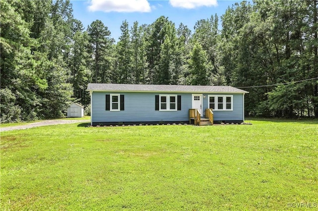 22805 Carson Rd, Carson, VA 23841 - manufactured / mobile home featuring a shed and a front lawn