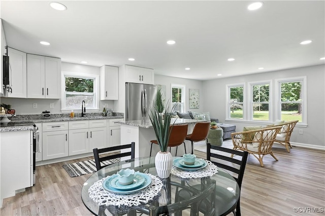 22805 Carson Rd, Carson, VA 23841 - dining area featuring healthy amount of natural light, recessed lighting, and light wood-style floors