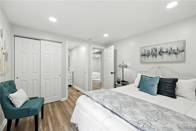 22805 Carson Rd, Carson, VA 23841 - bedroom featuring a closet, light wood-style floors, and recessed lighting