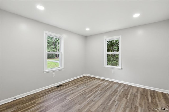 22805 Carson Rd, Carson, VA 23841 - empty room with wood finished floors and recessed lighting