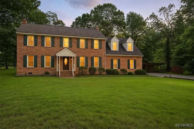 13241 Bailey Bridge Rd, North Chesterfield, VA 23112 - colonial inspired home featuring a chimney, brick siding, and a lawn