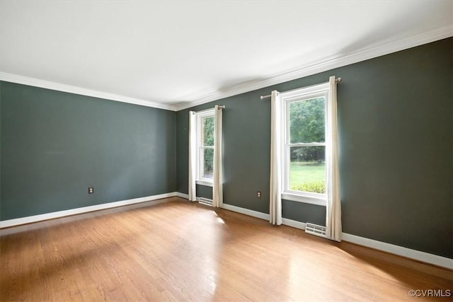 13241 Bailey Bridge Rd, North Chesterfield, VA 23112 - spare room featuring ornamental molding and wood finished floors