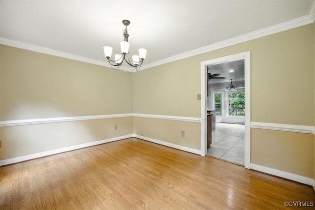 13241 Bailey Bridge Rd, North Chesterfield, VA 23112 - empty room featuring a chandelier, light wood-type flooring, and crown molding