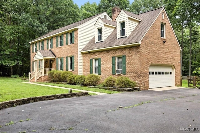 13241 Bailey Bridge Rd, North Chesterfield, VA 23112 - colonial inspired home featuring brick siding, driveway, a chimney, a garage, and a front lawn