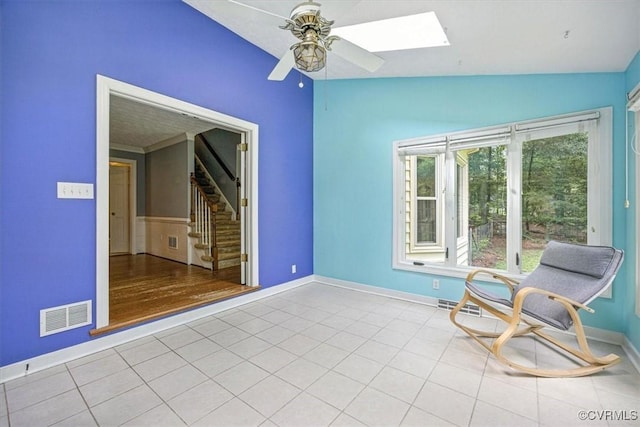 13241 Bailey Bridge Rd, North Chesterfield, VA 23112 - sitting room with ceiling fan, stairs, a skylight, and tile patterned flooring