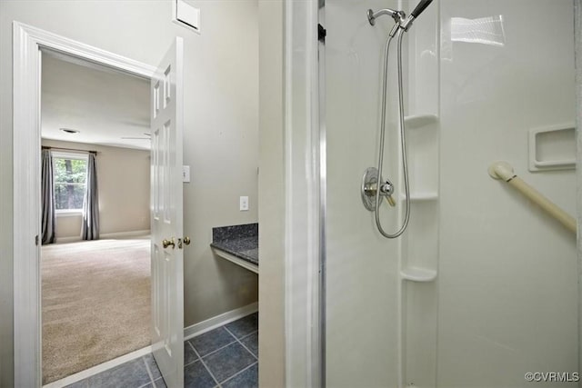 13241 Bailey Bridge Rd, North Chesterfield, VA 23112 - bathroom featuring a stall shower and tile patterned floors