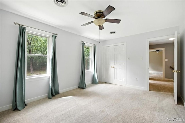 13241 Bailey Bridge Rd, North Chesterfield, VA 23112 - unfurnished bedroom with multiple windows, carpet flooring, and a closet