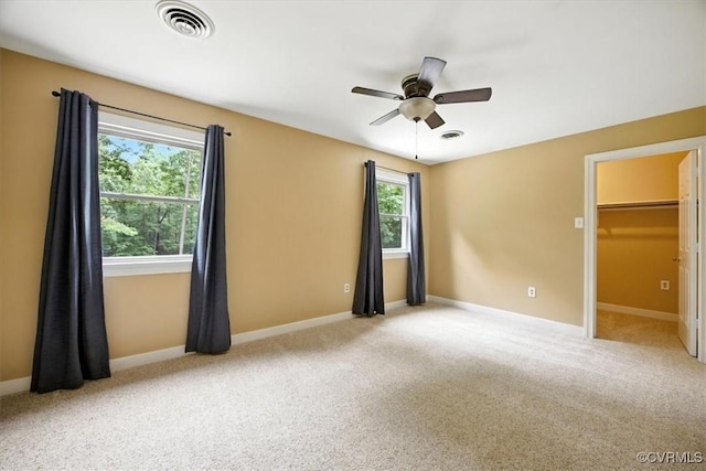 13241 Bailey Bridge Rd, North Chesterfield, VA 23112 - unfurnished bedroom with carpet flooring, a walk in closet, and ceiling fan