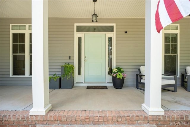 1450 Palmore Rd, Powhatan, VA 23139 - view of exterior entry with a porch