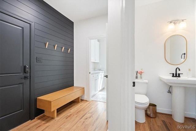 1450 Palmore Rd, Powhatan, VA 23139 - bathroom with wood finished floors and toilet