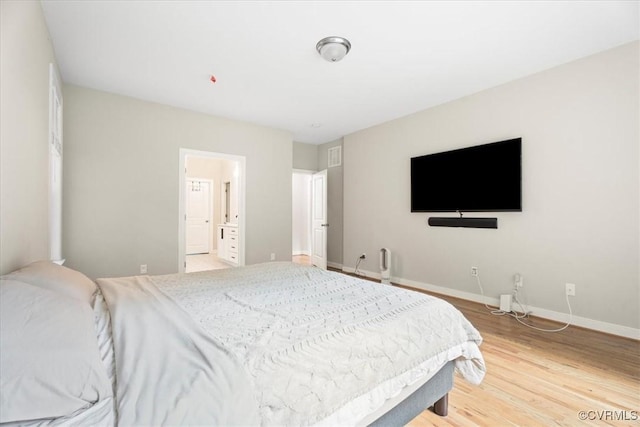 1450 Palmore Rd, Powhatan, VA 23139 - bedroom with light wood-style flooring and baseboards