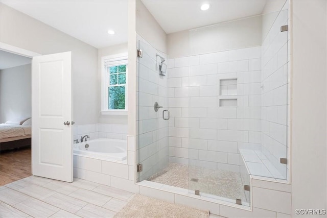 1450 Palmore Rd, Powhatan, VA 23139 - ensuite bathroom featuring a garden tub, a shower stall, recessed lighting, and tile patterned flooring
