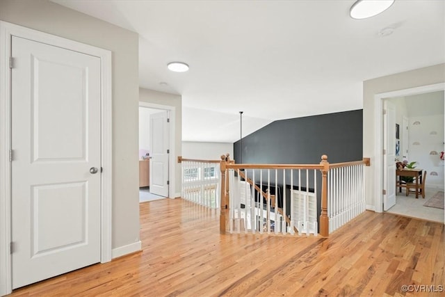 1450 Palmore Rd, Powhatan, VA 23139 - corridor with an upstairs landing and wood finished floors