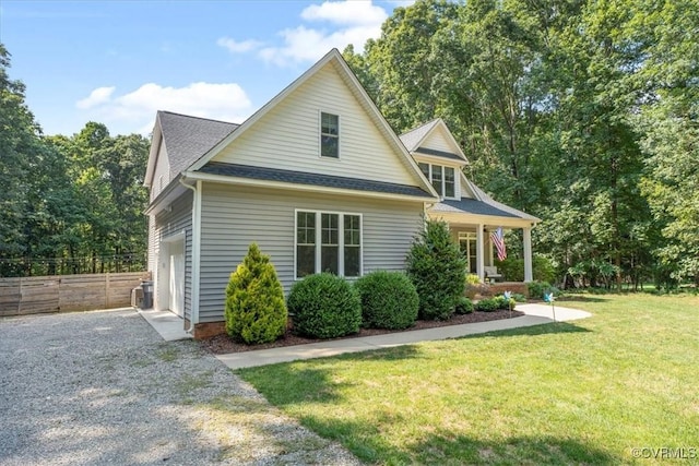 1450 Palmore Rd, Powhatan, VA 23139 - view of side of property featuring driveway, roof with shingles, and covered porch