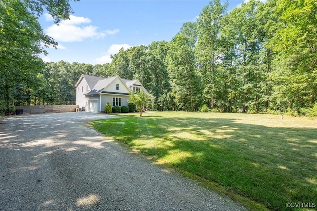 1450 Palmore Rd, Powhatan, VA 23139 - view of front facade with driveway and a forest view