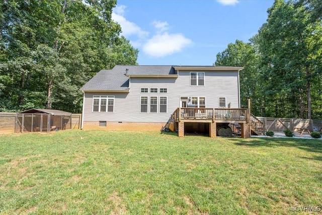 1450 Palmore Rd, Powhatan, VA 23139 - rear view of house featuring a fenced backyard, a deck, crawl space, stairway, and exterior structure