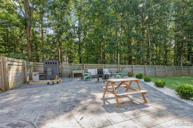 1450 Palmore Rd, Powhatan, VA 23139 - fenced backyard with a patio area