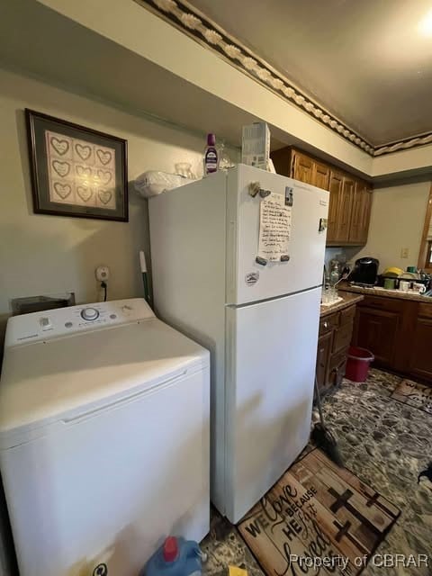 4487 Tidewater Trl, Jamaica, VA 23079 - washroom featuring washer / dryer