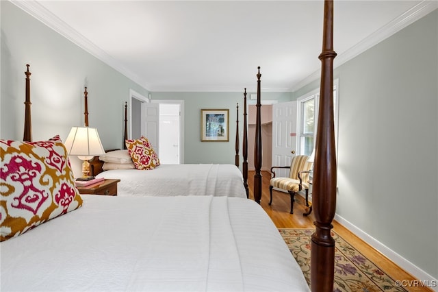 9039 Wood Sorrel Dr, Henrico, VA 23229 - bedroom with wood finished floors and ornamental molding