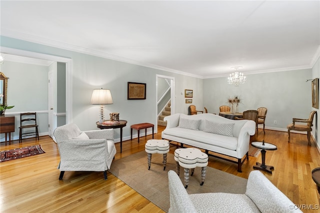 9039 Wood Sorrel Dr, Henrico, VA 23229 - living area with a chandelier, stairs, crown molding, and wood finished floors