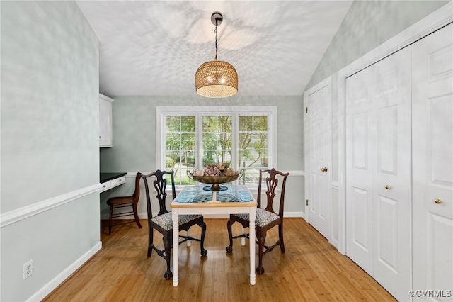 9039 Wood Sorrel Dr, Henrico, VA 23229 - dining room featuring light wood-style flooring and lofted ceiling