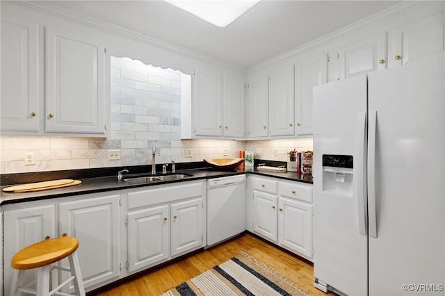 9039 Wood Sorrel Dr, Henrico, VA 23229 - kitchen featuring white appliances, dark countertops, white cabinetry, backsplash, and crown molding