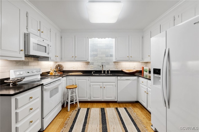 9039 Wood Sorrel Dr, Henrico, VA 23229 - kitchen with white appliances, dark countertops, white cabinets, light wood-style flooring, and decorative backsplash