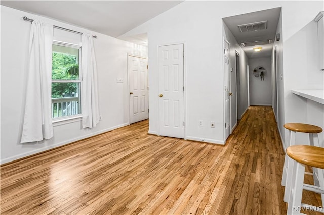 4508 Philips Path, Kents Store, VA 23084 - unfurnished room featuring light wood-type flooring and vaulted ceiling